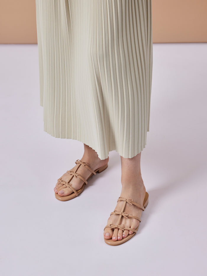 PAZZION, Elena Bow Cage Patent Leather Slides, Almond