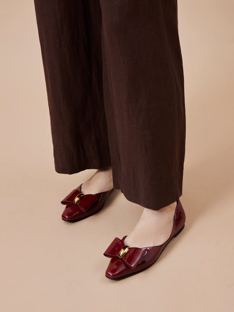 PAZZION, Kara Gold Accented Sculpted Bow Patent Flats, Wine