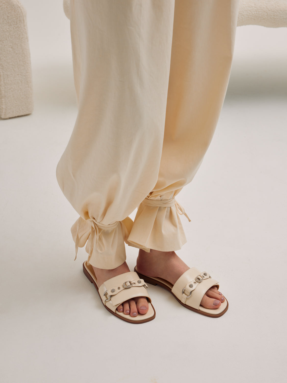 PAZZION, Bianca Stud and Buckle Leather Slides, Beige