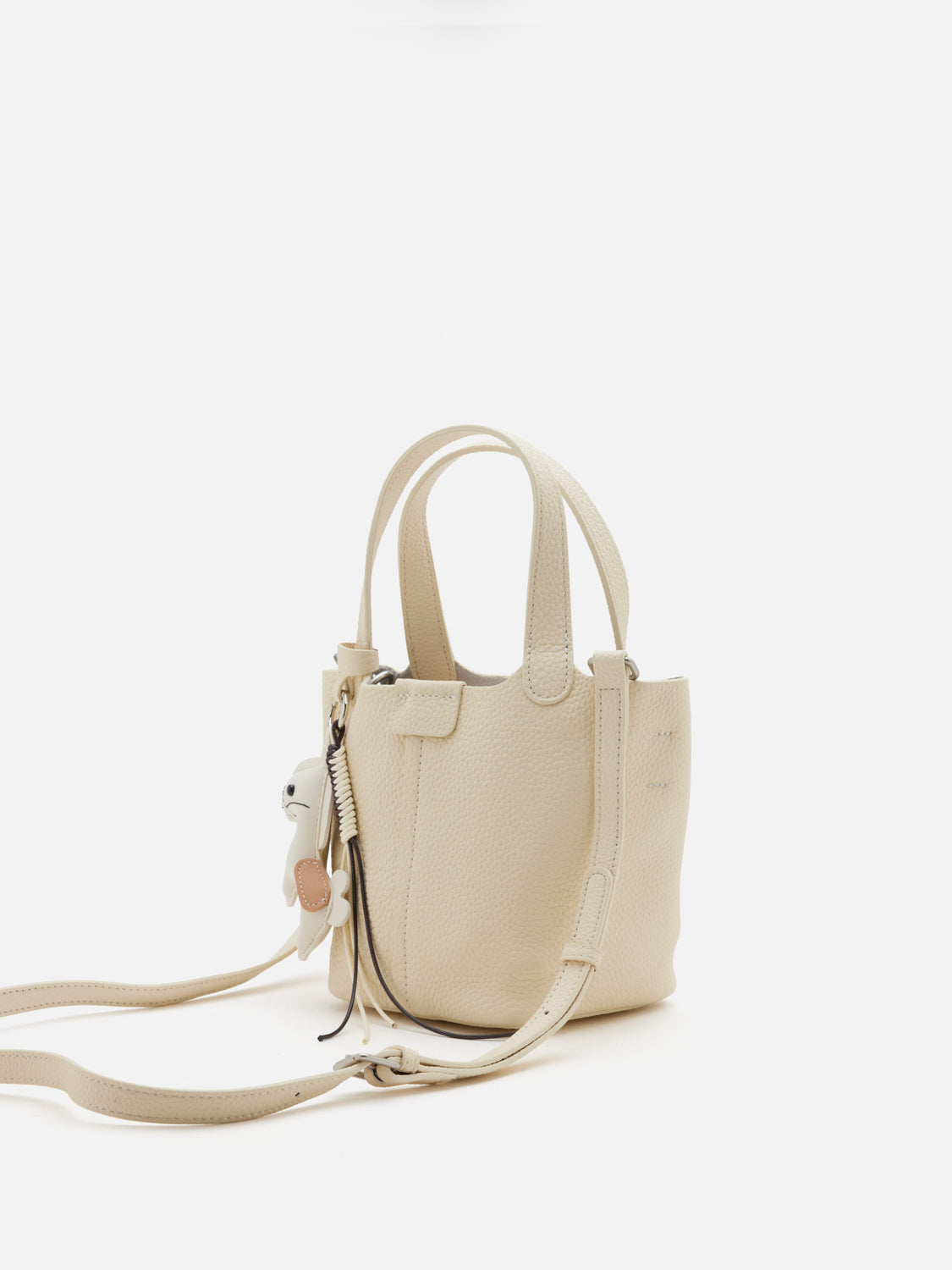 PAZZION, Delaney Leather Charmed Bucket Bag, Beige