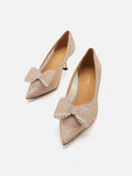 PAZZION, Guinevere Crystal Embellished Bow Perforated Heels, Champagne